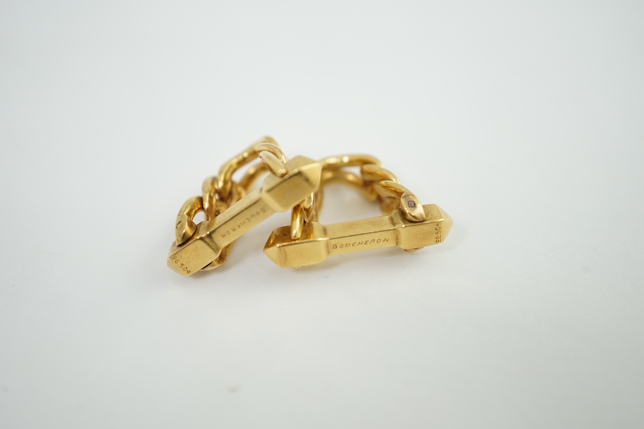 A pair of 18K yellow gold stirrup cufflinks, by Boucheron